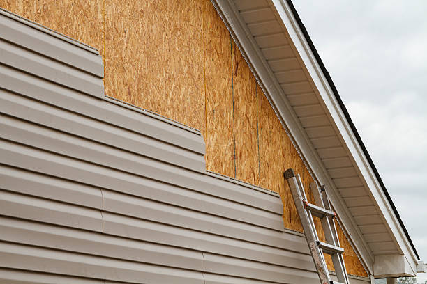Professional Siding Contractor technician working in Andover, CT